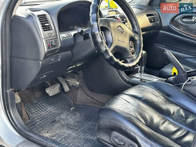 Серый Ниссан Максима, объемом двигателя 3 л и пробегом 390 тыс. км за 2000 $, фото 8 на Automoto.ua