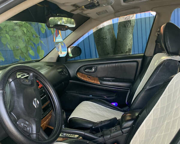 Серый Ниссан Максима, объемом двигателя 3 л и пробегом 328 тыс. км за 4600 $, фото 11 на Automoto.ua