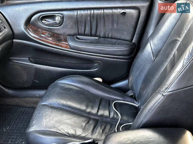 Серый Ниссан Максима, объемом двигателя 3 л и пробегом 390 тыс. км за 2000 $, фото 10 на Automoto.ua
