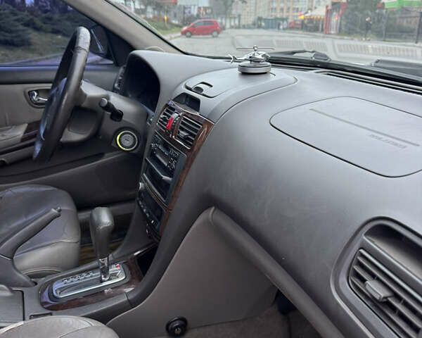 Серый Ниссан Максима, объемом двигателя 2 л и пробегом 285 тыс. км за 2350 $, фото 20 на Automoto.ua