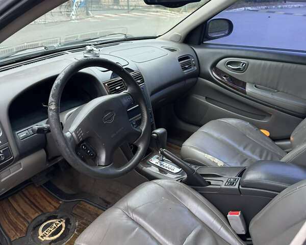 Серый Ниссан Максима, объемом двигателя 2 л и пробегом 285 тыс. км за 2350 $, фото 18 на Automoto.ua