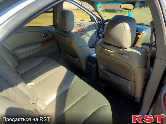 Серый Ниссан Максима, объемом двигателя 2 л и пробегом 400 тыс. км за 4500 $, фото 4 на Automoto.ua