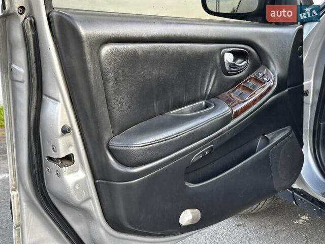 Серый Ниссан Максима, объемом двигателя 3 л и пробегом 390 тыс. км за 2000 $, фото 7 на Automoto.ua