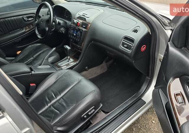 Серый Ниссан Максима, объемом двигателя 2.99 л и пробегом 364 тыс. км за 4100 $, фото 5 на Automoto.ua