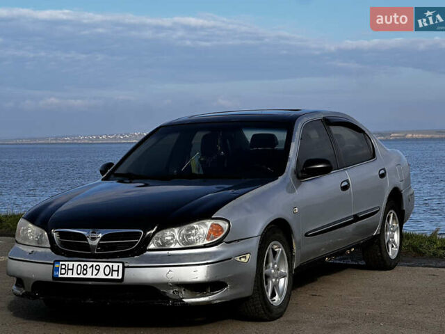 Серый Ниссан Максима, объемом двигателя 3 л и пробегом 390 тыс. км за 2000 $, фото 2 на Automoto.ua