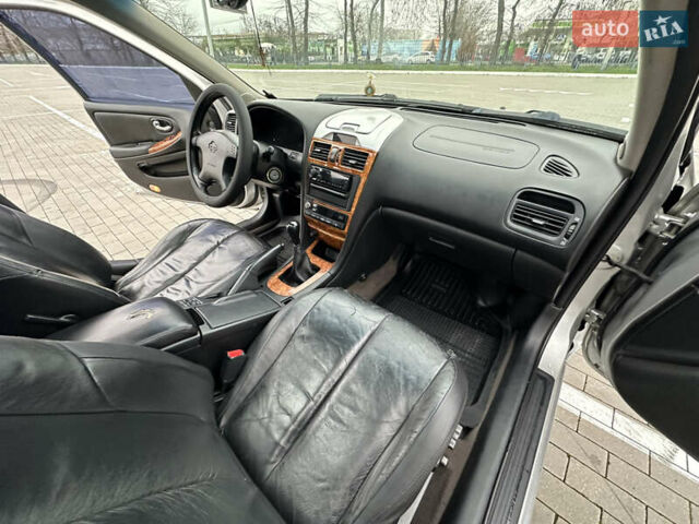 Серый Ниссан Максима, объемом двигателя 2 л и пробегом 286 тыс. км за 4999 $, фото 46 на Automoto.ua