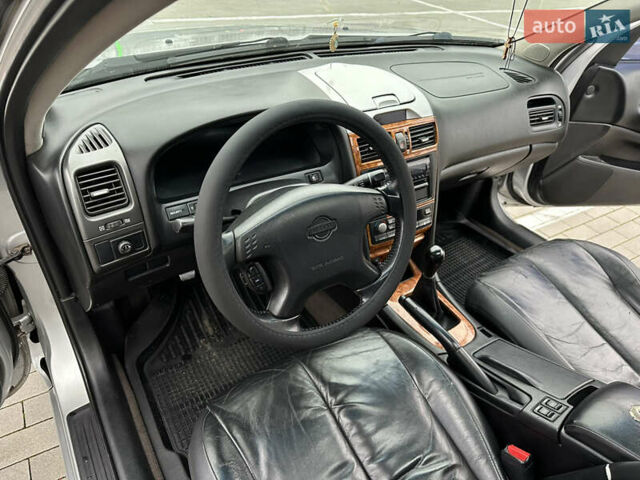 Серый Ниссан Максима, объемом двигателя 2 л и пробегом 286 тыс. км за 4999 $, фото 33 на Automoto.ua