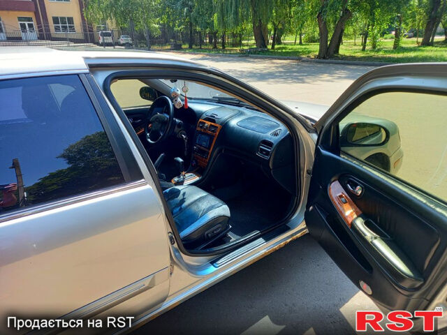 Сірий Ніссан Максіма, об'ємом двигуна 2 л та пробігом 270 тис. км за 3800 $, фото 4 на Automoto.ua