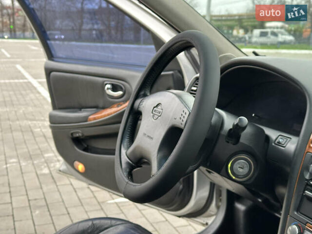 Серый Ниссан Максима, объемом двигателя 2 л и пробегом 286 тыс. км за 4999 $, фото 49 на Automoto.ua