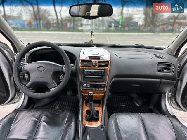 Серый Ниссан Максима, объемом двигателя 2 л и пробегом 286 тыс. км за 4999 $, фото 4 на Automoto.ua