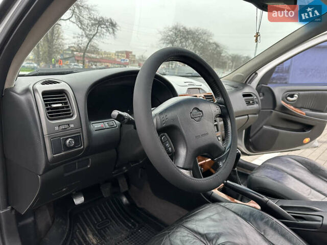 Серый Ниссан Максима, объемом двигателя 2 л и пробегом 286 тыс. км за 4999 $, фото 26 на Automoto.ua