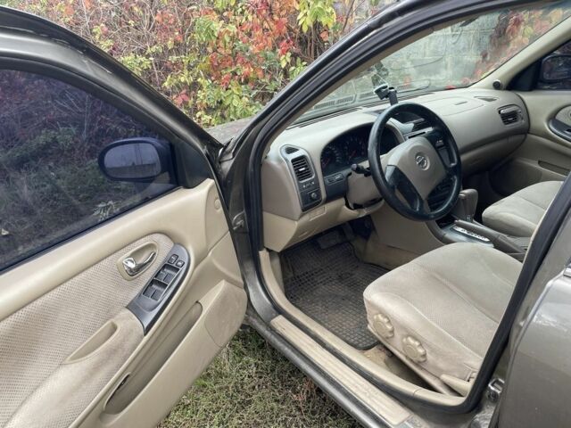 Серый Ниссан Максима, объемом двигателя 0 л и пробегом 450 тыс. км за 950 $, фото 2 на Automoto.ua