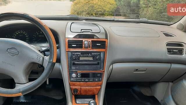 Сірий Ніссан Максіма, об'ємом двигуна 2 л та пробігом 252 тис. км за 4900 $, фото 8 на Automoto.ua
