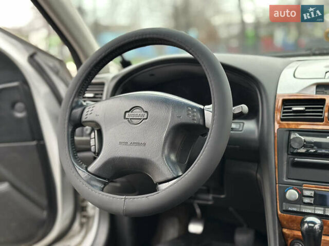 Серый Ниссан Максима, объемом двигателя 2 л и пробегом 286 тыс. км за 4999 $, фото 20 на Automoto.ua