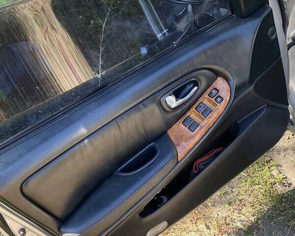 Серый Ниссан Максима, объемом двигателя 2 л и пробегом 250 тыс. км за 2200 $, фото 4 на Automoto.ua