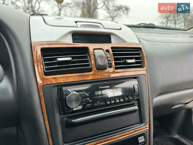 Серый Ниссан Максима, объемом двигателя 2 л и пробегом 286 тыс. км за 4999 $, фото 37 на Automoto.ua