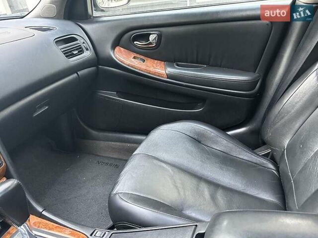 Сірий Ніссан Максіма, об'ємом двигуна 3 л та пробігом 300 тис. км за 3500 $, фото 4 на Automoto.ua