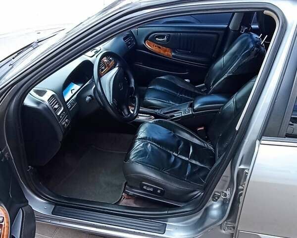 Серый Ниссан Максима, объемом двигателя 3 л и пробегом 323 тыс. км за 2900 $, фото 5 на Automoto.ua