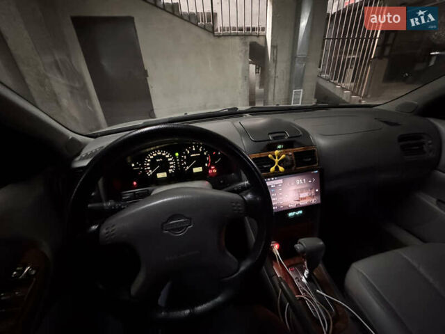 Серый Ниссан Максима, объемом двигателя 2 л и пробегом 227 тыс. км за 3500 $, фото 11 на Automoto.ua