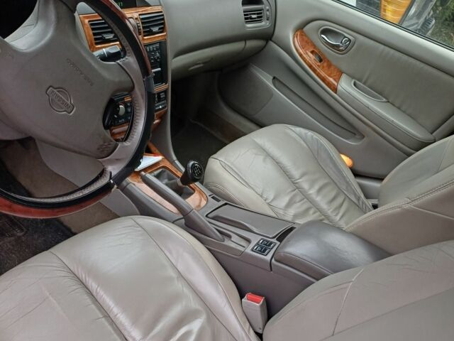 Серый Ниссан Максима, объемом двигателя 2 л и пробегом 230 тыс. км за 4300 $, фото 2 на Automoto.ua