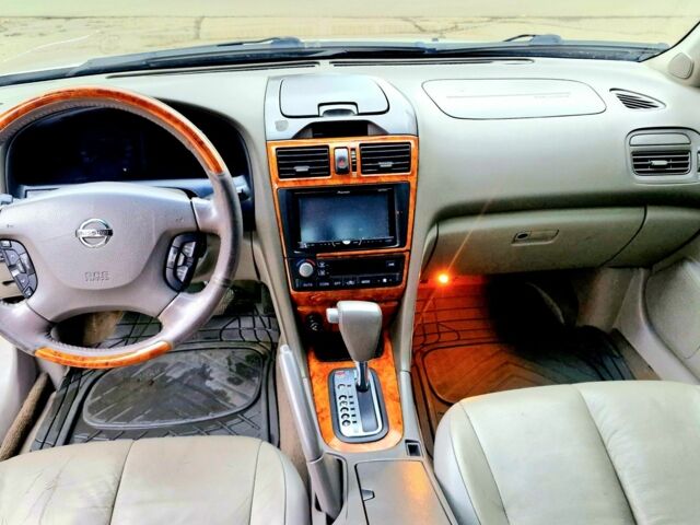 Серый Ниссан Максима, объемом двигателя 3 л и пробегом 200 тыс. км за 4900 $, фото 5 на Automoto.ua