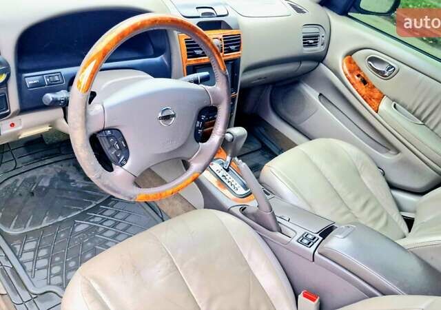 Серый Ниссан Максима, объемом двигателя 3 л и пробегом 262 тыс. км за 4900 $, фото 9 на Automoto.ua
