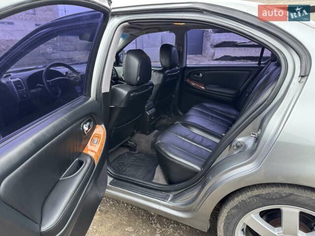 Серый Ниссан Максима, объемом двигателя 2 л и пробегом 280 тыс. км за 2200 $, фото 3 на Automoto.ua