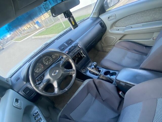 Серый Ниссан Максима, объемом двигателя 2 л и пробегом 250 тыс. км за 799 $, фото 1 на Automoto.ua