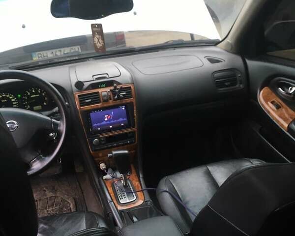 Серый Ниссан Максима, объемом двигателя 2 л и пробегом 235 тыс. км за 5700 $, фото 3 на Automoto.ua