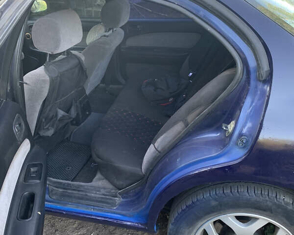 Синий Ниссан Максима, объемом двигателя 2 л и пробегом 302 тыс. км за 2300 $, фото 3 на Automoto.ua