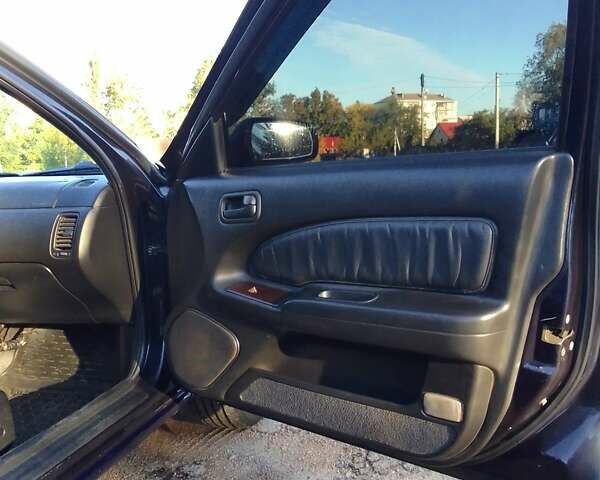 Синій Ніссан Максіма, об'ємом двигуна 3 л та пробігом 400 тис. км за 2850 $, фото 6 на Automoto.ua