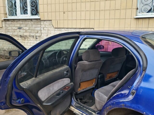 Синій Ніссан Максіма, об'ємом двигуна 3 л та пробігом 300 тис. км за 950 $, фото 6 на Automoto.ua