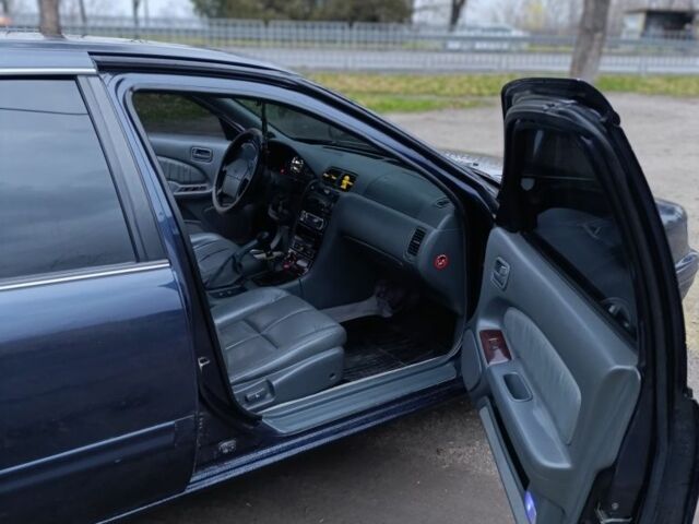 Синий Ниссан Максима, объемом двигателя 3 л и пробегом 359 тыс. км за 2300 $, фото 7 на Automoto.ua