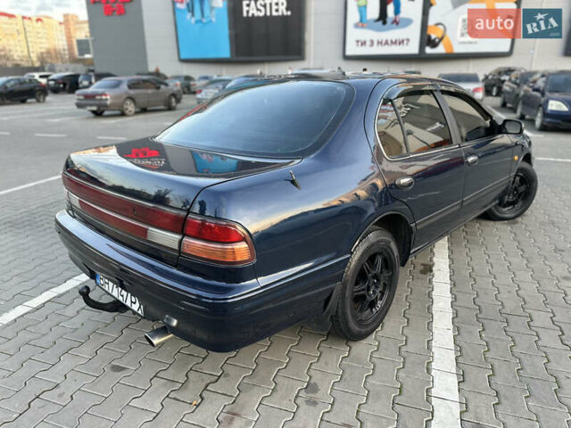 Синий Ниссан Максима, объемом двигателя 3 л и пробегом 290 тыс. км за 1950 $, фото 4 на Automoto.ua