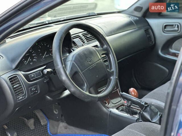 Синий Ниссан Максима, объемом двигателя 3 л и пробегом 290 тыс. км за 1950 $, фото 6 на Automoto.ua