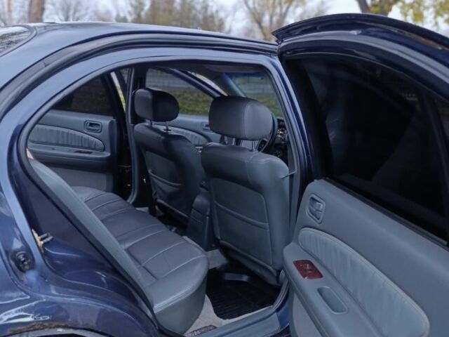 Синий Ниссан Максима, объемом двигателя 3 л и пробегом 359 тыс. км за 2300 $, фото 8 на Automoto.ua