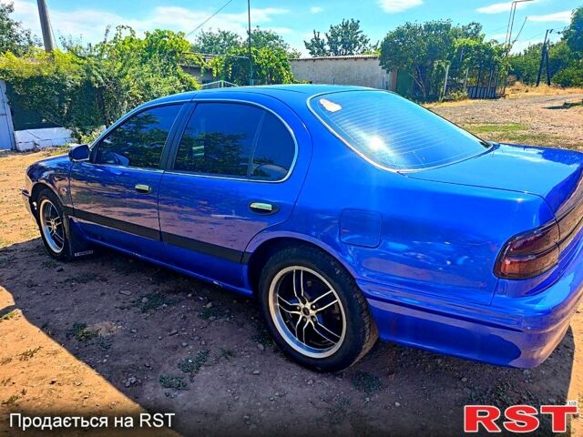 Синий Ниссан Максима, объемом двигателя 3 л и пробегом 350 тыс. км за 2750 $, фото 2 на Automoto.ua