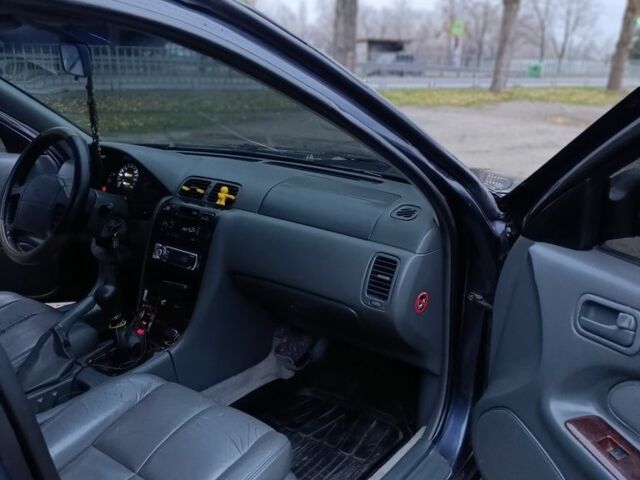 Синий Ниссан Максима, объемом двигателя 3 л и пробегом 359 тыс. км за 2300 $, фото 11 на Automoto.ua