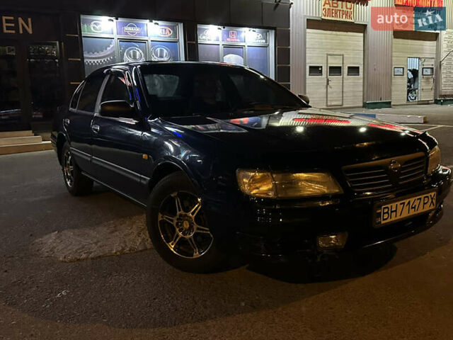 Синий Ниссан Максима, объемом двигателя 3 л и пробегом 180 тыс. км за 2700 $, фото 18 на Automoto.ua