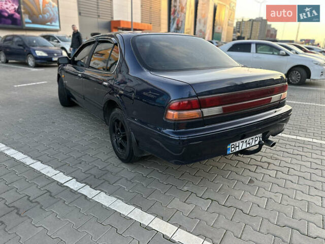 Синий Ниссан Максима, объемом двигателя 3 л и пробегом 290 тыс. км за 1950 $, фото 2 на Automoto.ua