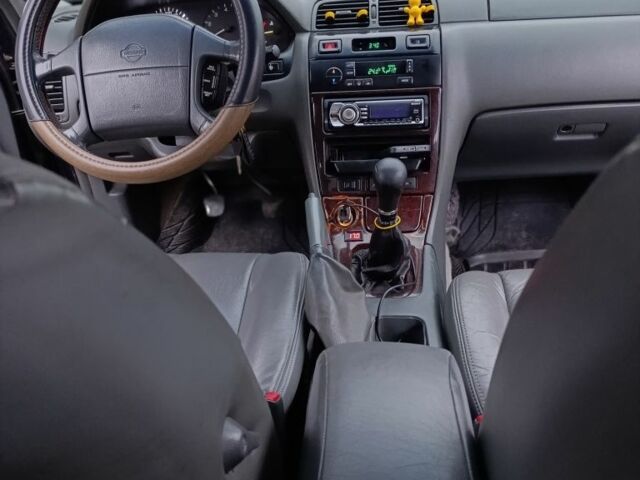 Синий Ниссан Максима, объемом двигателя 3 л и пробегом 359 тыс. км за 2300 $, фото 12 на Automoto.ua