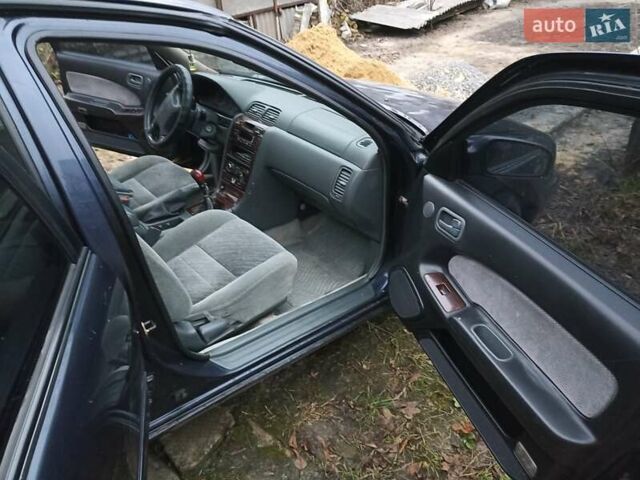 Синий Ниссан Максима, объемом двигателя 2.99 л и пробегом 500 тыс. км за 1300 $, фото 10 на Automoto.ua
