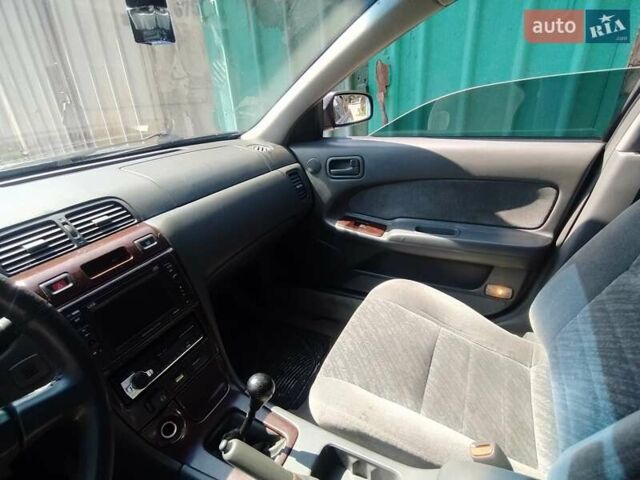 Синий Ниссан Максима, объемом двигателя 2 л и пробегом 345 тыс. км за 2500 $, фото 5 на Automoto.ua