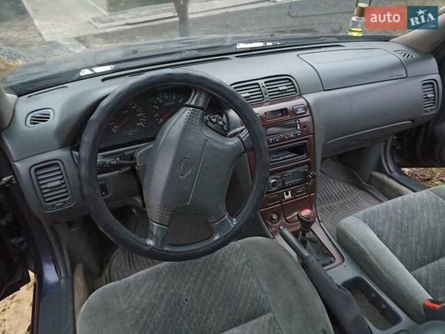 Синий Ниссан Максима, объемом двигателя 2.99 л и пробегом 500 тыс. км за 1300 $, фото 14 на Automoto.ua