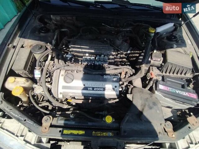 Синий Ниссан Максима, объемом двигателя 2 л и пробегом 345 тыс. км за 2500 $, фото 6 на Automoto.ua