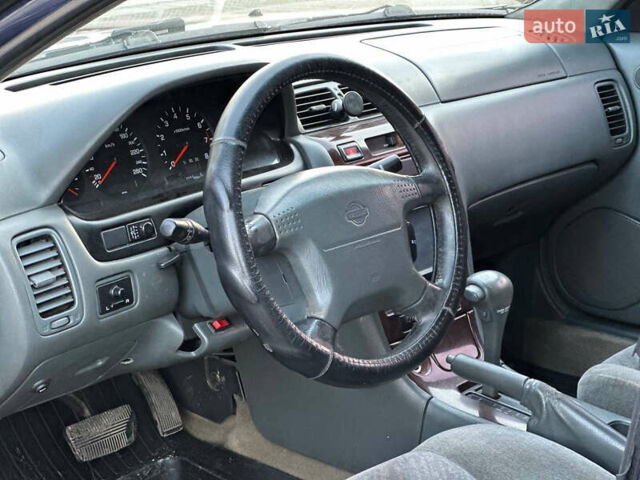 Синий Ниссан Максима, объемом двигателя 2 л и пробегом 350 тыс. км за 2100 $, фото 6 на Automoto.ua