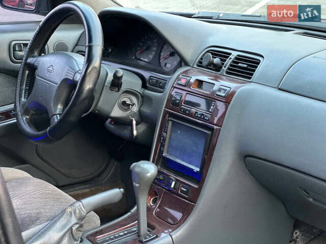 Синий Ниссан Максима, объемом двигателя 2 л и пробегом 350 тыс. км за 2100 $, фото 7 на Automoto.ua