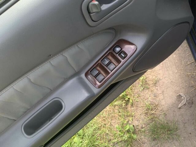 Синій Ніссан Максіма, об'ємом двигуна 3 л та пробігом 300 тис. км за 2300 $, фото 2 на Automoto.ua