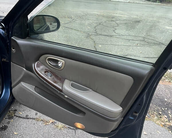 Синий Ниссан Максима, объемом двигателя 2.99 л и пробегом 450 тыс. км за 2700 $, фото 23 на Automoto.ua