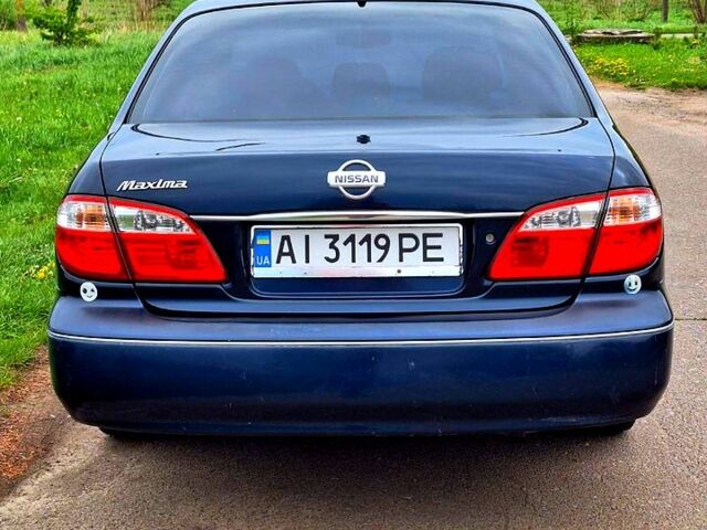 Синий Ниссан Максима, объемом двигателя 2 л и пробегом 280 тыс. км за 2100 $, фото 3 на Automoto.ua